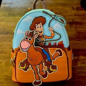 Brand new LoungeFly! Toy Story - Woody and Bullseye